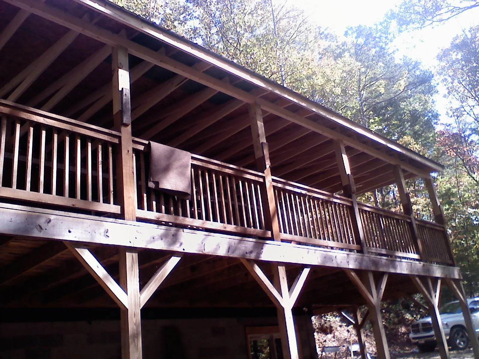 Timber framing under a new elevated porch and deck — Roof Leak Repair in Osco by Roofing Brothers